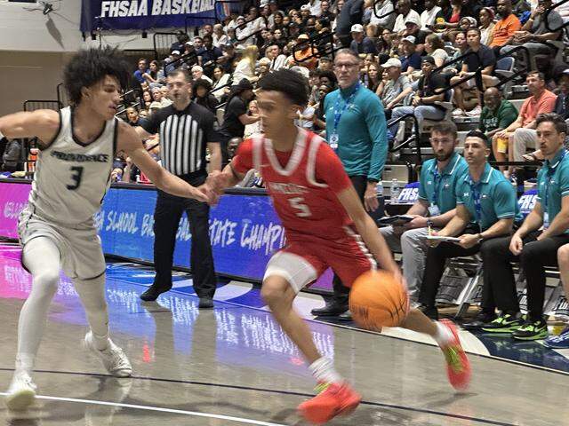 Miami Country Day’s Miguel Orbe drives to the basket during Saturday’s Class 2A state championship game against Jacksonville Providence at the UNF Arena in Jacksonville, Fla.